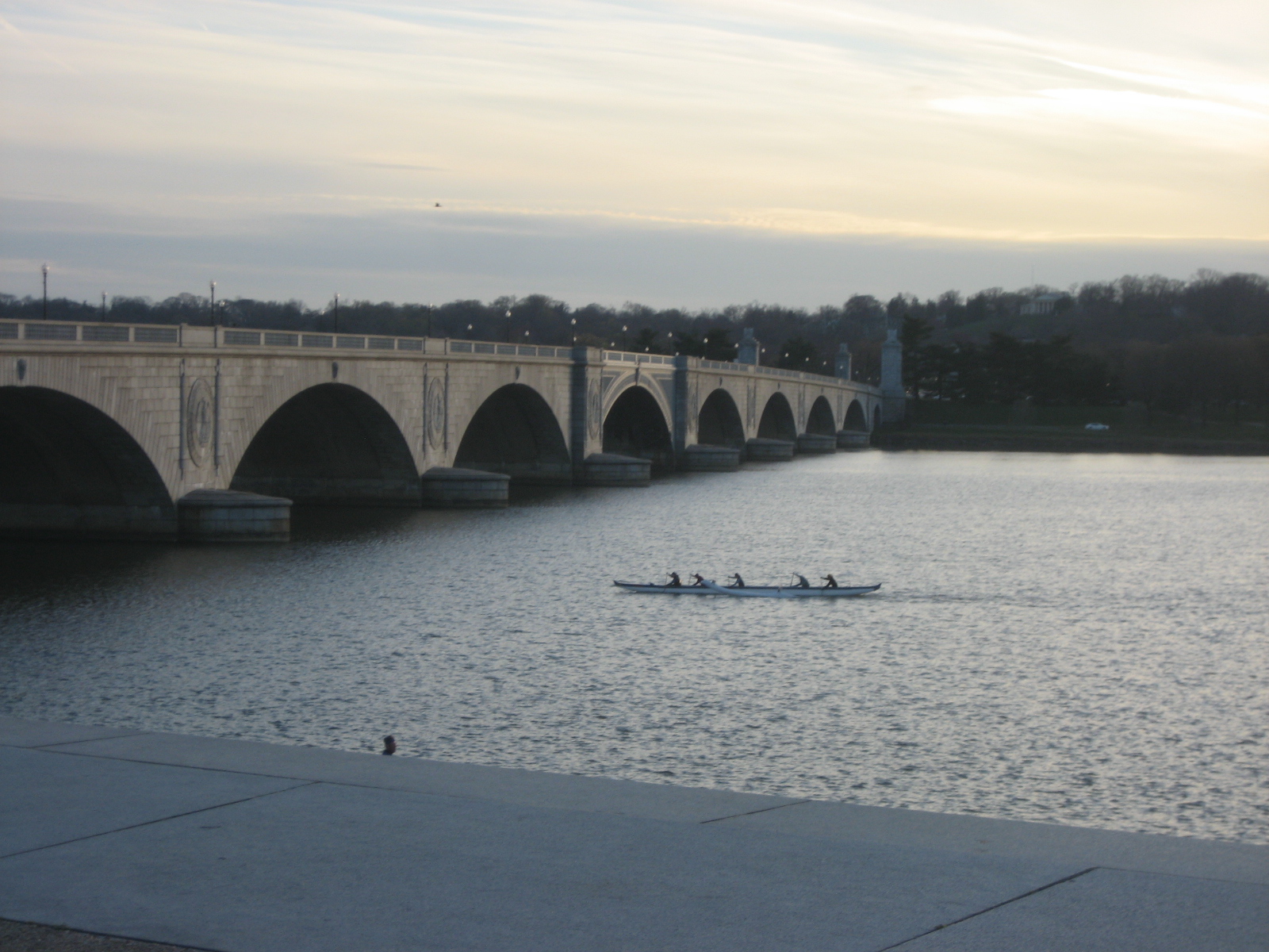Rowers in the Potomac at sunset along Memorial Bridge